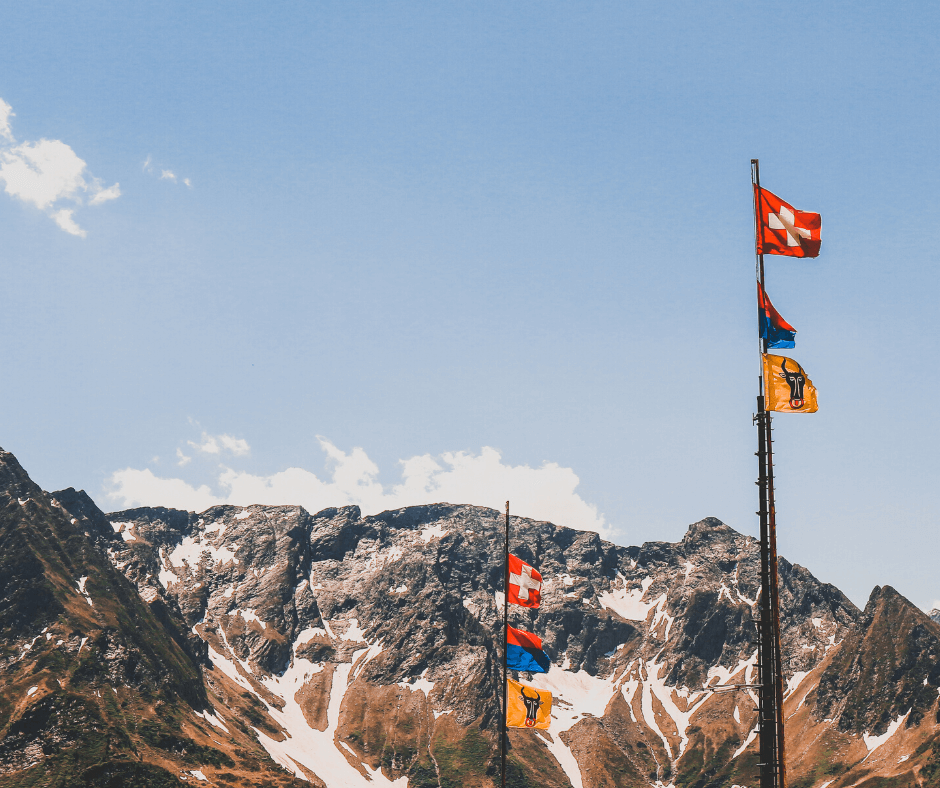 Switzerland flag in Mountains